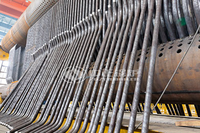 The pipe threading of ZOZEN SZS series boiler is undergoing