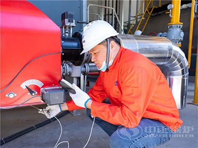 The staff of the special inspection institute is conducting on-site inspection of the boiler